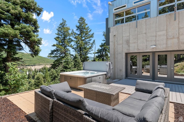 105 S Crestview Cir, Park City, UT 84098 - view of patio / terrace with french doors, a hot tub, outdoor lounge area, and a wooden deck