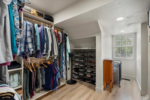 866 Brookside Ln, Centerville, UT 84014 - walk in closet featuring wood finished floors