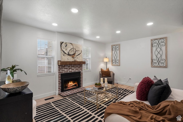 866 Brookside Ln, Centerville, UT 84014 - living area with a fireplace, recessed lighting, and light wood finished floors