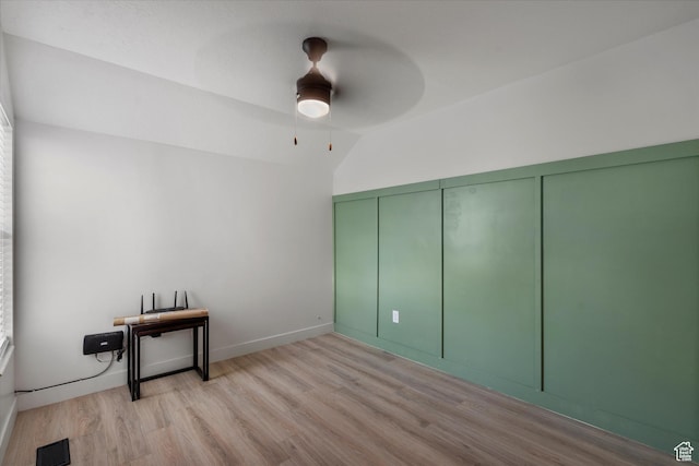 866 Brookside Ln, Centerville, UT 84014 - spare room featuring lofted ceiling, light wood finished floors, and a ceiling fan