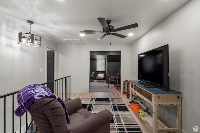 866 Brookside Ln, Centerville, UT 84014 - living room featuring ceiling fan, wood finished floors, and recessed lighting