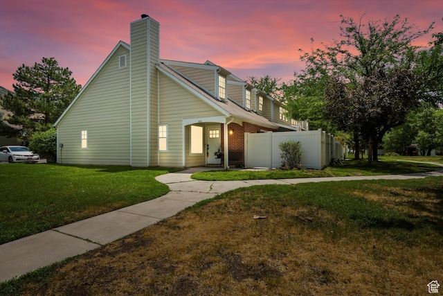 866 Brookside Ln, Centerville, UT 84014 - view of front of home featuring a chimney and brick siding