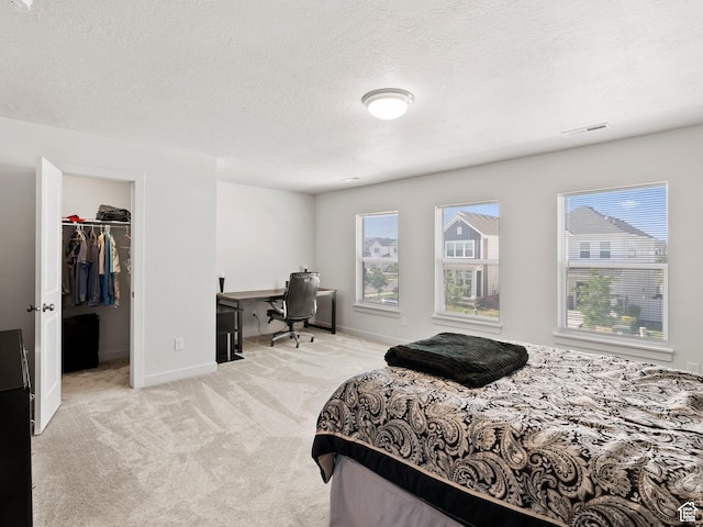 1583 W Andover Rd, South Jordan, UT 84095 - bedroom featuring carpet flooring, a desk, a spacious closet, and a textured ceiling