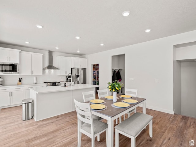 1583 W Andover Rd, South Jordan, UT 84095 - dining space with light wood-type flooring and recessed lighting