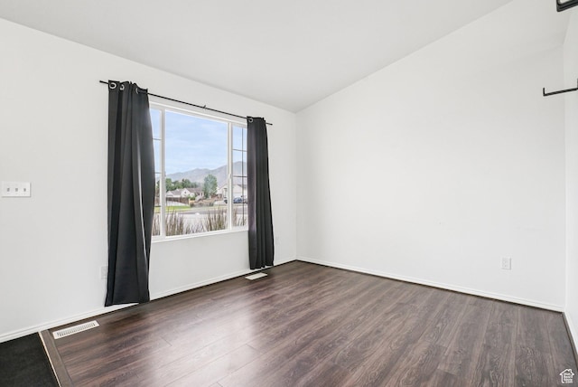 468 E Lindy Way N, Tooele, UT 84074 - unfurnished room featuring dark wood finished floors and lofted ceiling