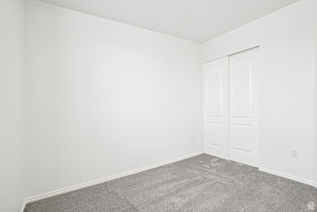 468 E Lindy Way N, Tooele, UT 84074 - unfurnished bedroom with carpet floors and a closet