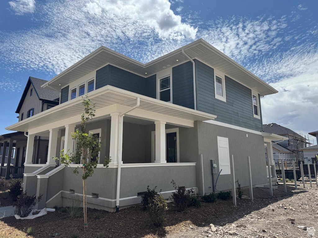 7186 S Ramble Rd W Unit 251, West Jordan, UT 84081 - view of side of property featuring covered porch
