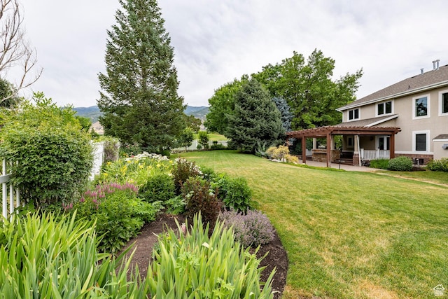 999 S Fairway Cir, Fruit Heights, UT 84037 - view of grassy yard featuring a mountain view and a patio area