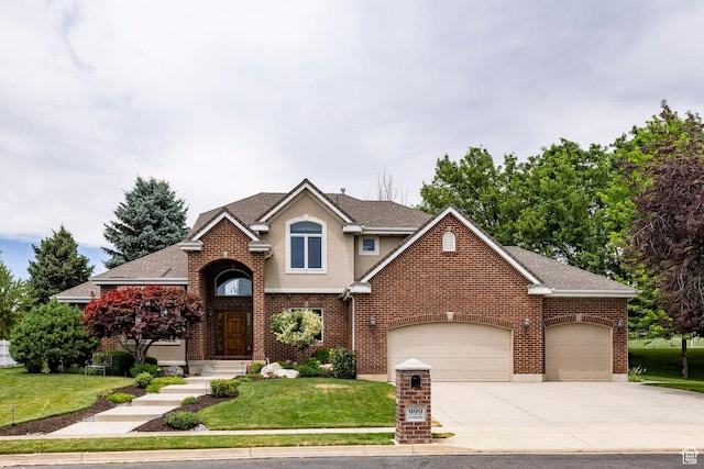 999 S Fairway Cir, Fruit Heights, UT 84037 - traditional-style home featuring an attached garage, a front yard, driveway, and stucco siding