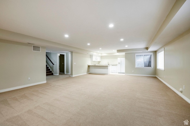 999 S Fairway Cir, Fruit Heights, UT 84037 - unfurnished living room featuring light colored carpet, recessed lighting, and stairway