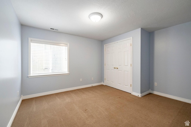 999 S Fairway Cir, Fruit Heights, UT 84037 - unfurnished bedroom featuring carpet floors and a closet