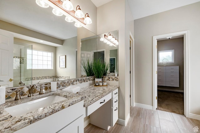 999 S Fairway Cir, Fruit Heights, UT 84037 - bathroom featuring vanity and tiled shower