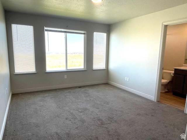 228 W 2370 N, Tooele, UT 84074 - carpeted empty room with baseboards