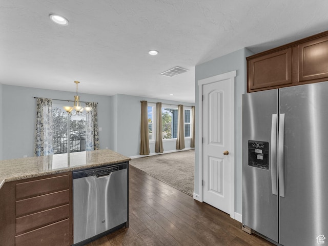 81 E E Side Hill Ln S, Draper, UT 84020 - kitchen with appliances with stainless steel finishes, a chandelier, dark wood-style floors, recessed lighting, and light stone counters