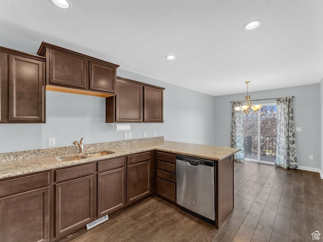 81 E E Side Hill Ln S, Draper, UT 84020 - kitchen with stainless steel dishwasher, a chandelier, dark wood-style floors, a peninsula, and light stone countertops
