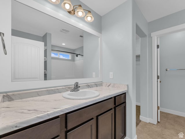 81 E E Side Hill Ln S, Draper, UT 84020 - full bath with vanity, a shower, and a walk in closet