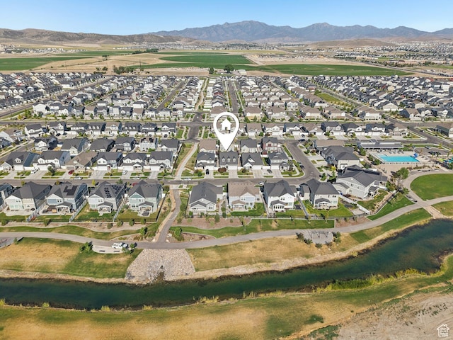 287 S Hayes Well Ln, Saratoga Springs, UT 84045 - aerial overview of property's location featuring a mountain backdrop and nearby suburban area