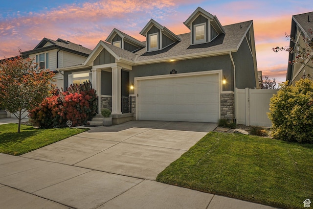 287 S Hayes Well Ln, Saratoga Springs, UT 84045 - view of front of property with stone siding, concrete driveway, an attached garage, roof with shingles, and stucco siding