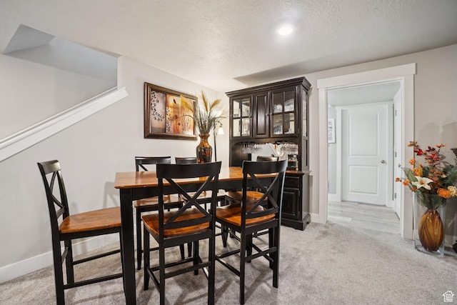 287 S Hayes Well Ln, Saratoga Springs, UT 84045 - dining space with light carpet and a textured ceiling