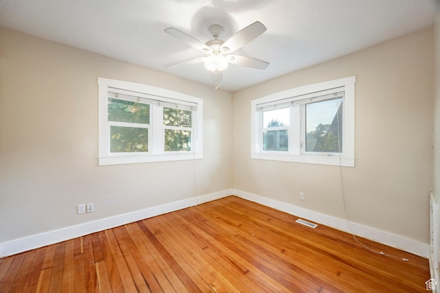3076 S Melbourne St, Millcreek, UT 84106 - spare room featuring healthy amount of natural light, light wood-type flooring, and ceiling fan