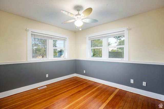 3076 S Melbourne St, Millcreek, UT 84106 - empty room with hardwood / wood-style flooring and a ceiling fan