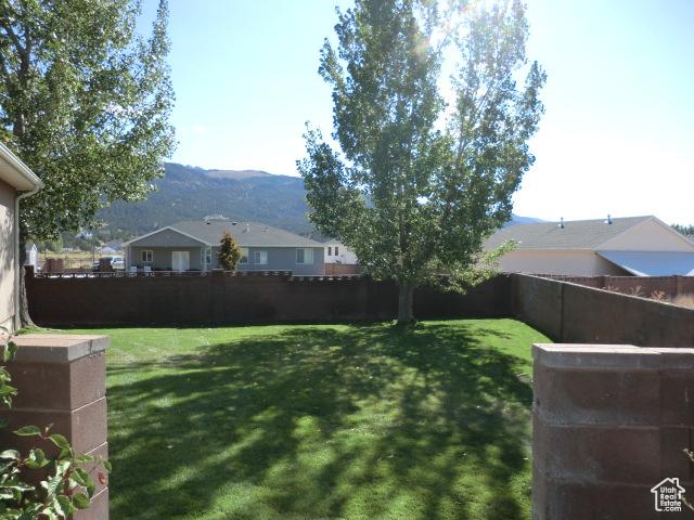 320 S 1125 W, Parowan, UT 84761 - fenced backyard with a mountain view