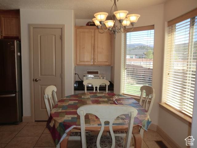 320 S 1125 W, Parowan, UT 84761 - dining room with a chandelier, healthy amount of natural light, and light tile patterned floors