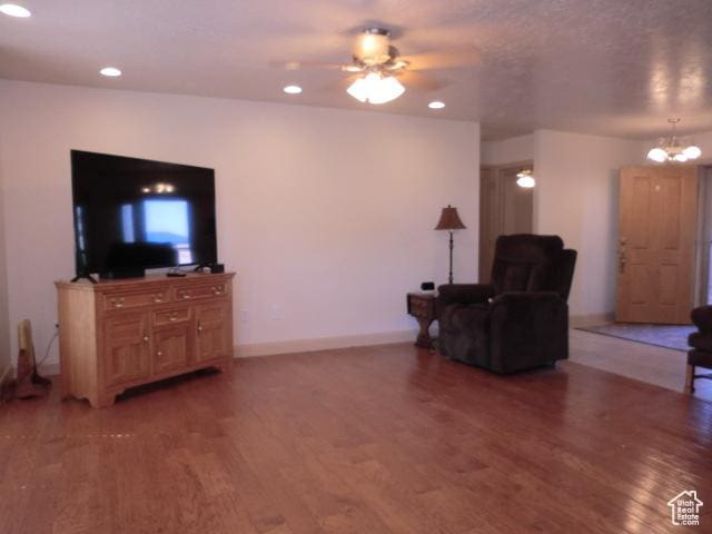 320 S 1125 W, Parowan, UT 84761 - living room with light wood-style flooring, ceiling fan, recessed lighting, and a chandelier