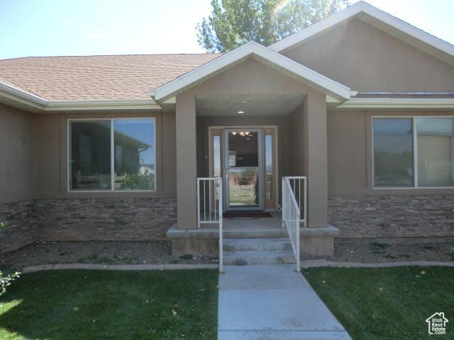 320 S 1125 W, Parowan, UT 84761 - entrance to property featuring stone siding, stucco siding, and a shingled roof