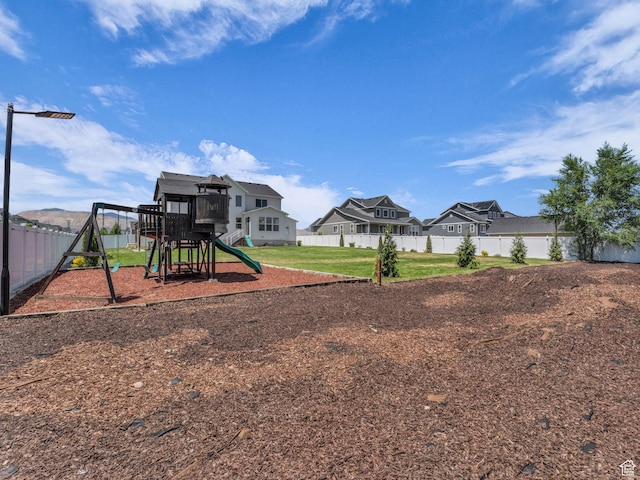 13249 S Shearing Cv, Herriman, UT 84096 - community jungle gym with a residential view