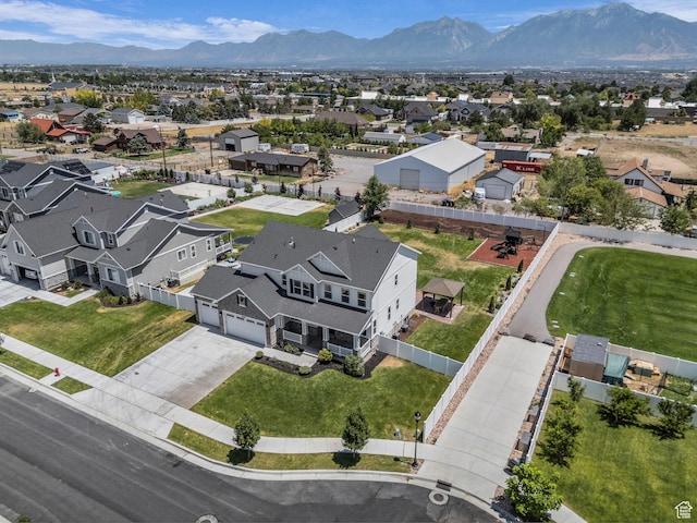 13249 S Shearing Cv, Herriman, UT 84096 - aerial perspective of suburban area with a mountainous background