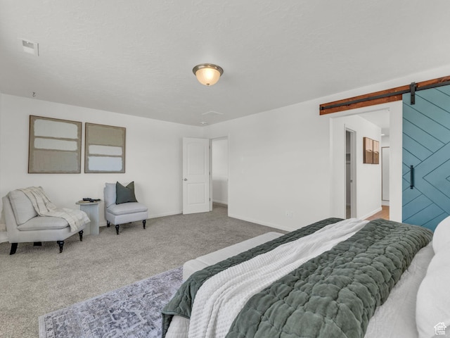 13249 S Shearing Cv, Herriman, UT 84096 - bedroom with a barn door and carpet floors