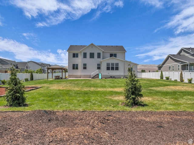 13249 S Shearing Cv, Herriman, UT 84096 - back of house with a gazebo, stucco siding, and roof with shingles