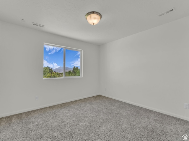 13249 S Shearing Cv, Herriman, UT 84096 - empty room featuring carpet floors and baseboards