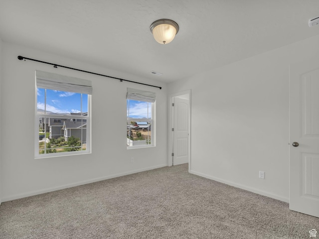 13249 S Shearing Cv, Herriman, UT 84096 - carpeted spare room with baseboards