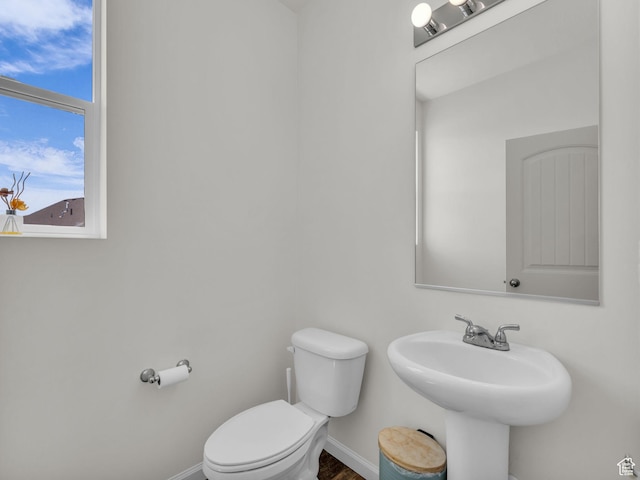 13249 S Shearing Cv, Herriman, UT 84096 - bathroom with toilet and baseboards