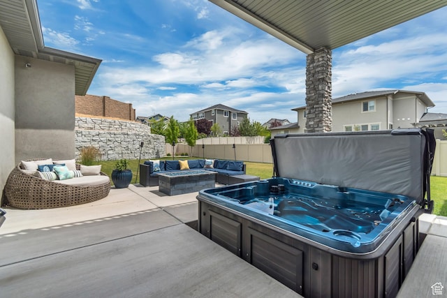 11531 S 840 W, Draper, UT 84020 - view of patio with a hot tub, an outdoor living space with a fire pit, and a residential view