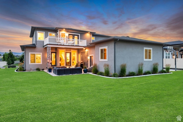 11531 S 840 W, Draper, UT 84020 - rear view of property with a balcony, a lawn, stucco siding, and a patio