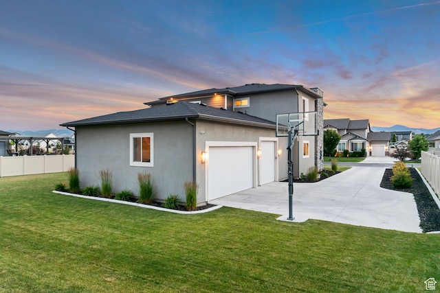 11531 S 840 W, Draper, UT 84020 - view of side of property featuring a garage, stucco siding, driveway, and a residential view