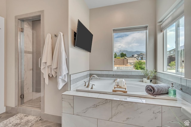 11531 S 840 W, Draper, UT 84020 - bathroom with a stall shower, healthy amount of natural light, and a garden tub
