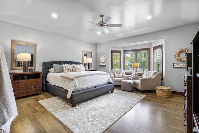 5584 N Gentle Breeze Ct, Stansbury Park, UT 84074 - bedroom with wood finished floors, recessed lighting, and a ceiling fan