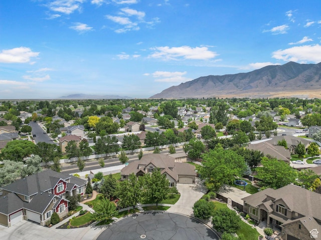 5584 N Gentle Breeze Ct, Stansbury Park, UT 84074 - aerial perspective of suburban area featuring a mountainous background