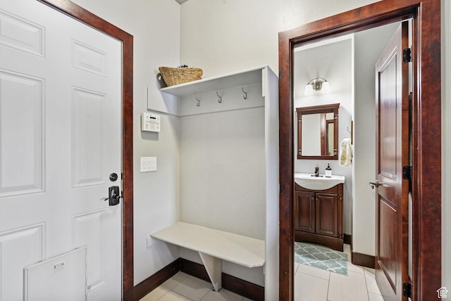 5584 N Gentle Breeze Ct, Stansbury Park, UT 84074 - mudroom featuring baseboards and light tile patterned floors
