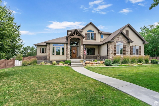 5584 N Gentle Breeze Ct, Stansbury Park, UT 84074 - view of front of property with stucco siding and stone siding