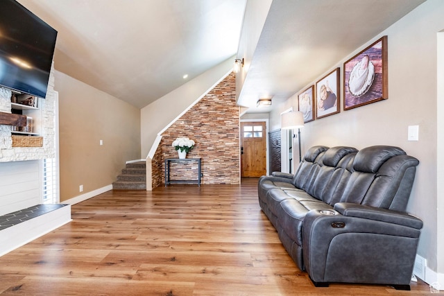 534 E 1400th St S, Bountiful, UT 84010 - living area featuring a fireplace, stairway, wood finished floors, and lofted ceiling