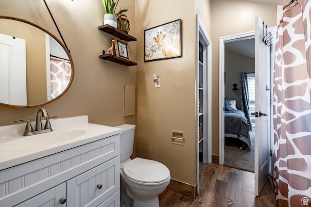 534 E 1400th St S, Bountiful, UT 84010 - ensuite bathroom featuring wood finished floors, vanity, and curtained shower