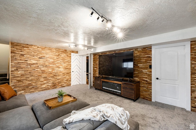 534 E 1400th St S, Bountiful, UT 84010 - carpeted living room with track lighting, a textured ceiling, and stairs