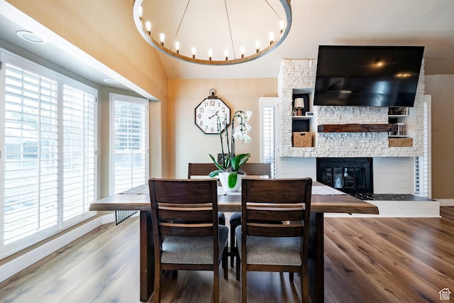 534 E 1400th St S, Bountiful, UT 84010 - dining space featuring wood finished floors, plenty of natural light, and a fireplace