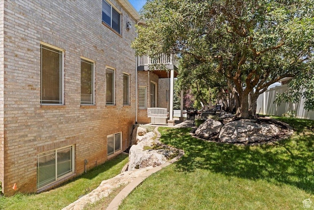 3680 N 2300 E, Layton, UT 84040 - view of grassy yard with a balcony