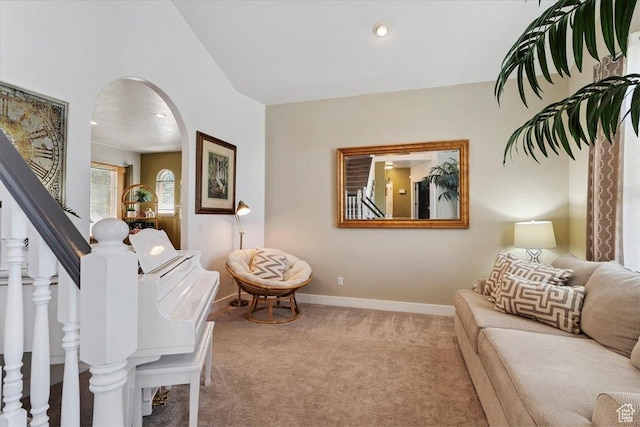 3680 N 2300 E, Layton, UT 84040 - living room with arched walkways, carpet floors, stairway, and recessed lighting